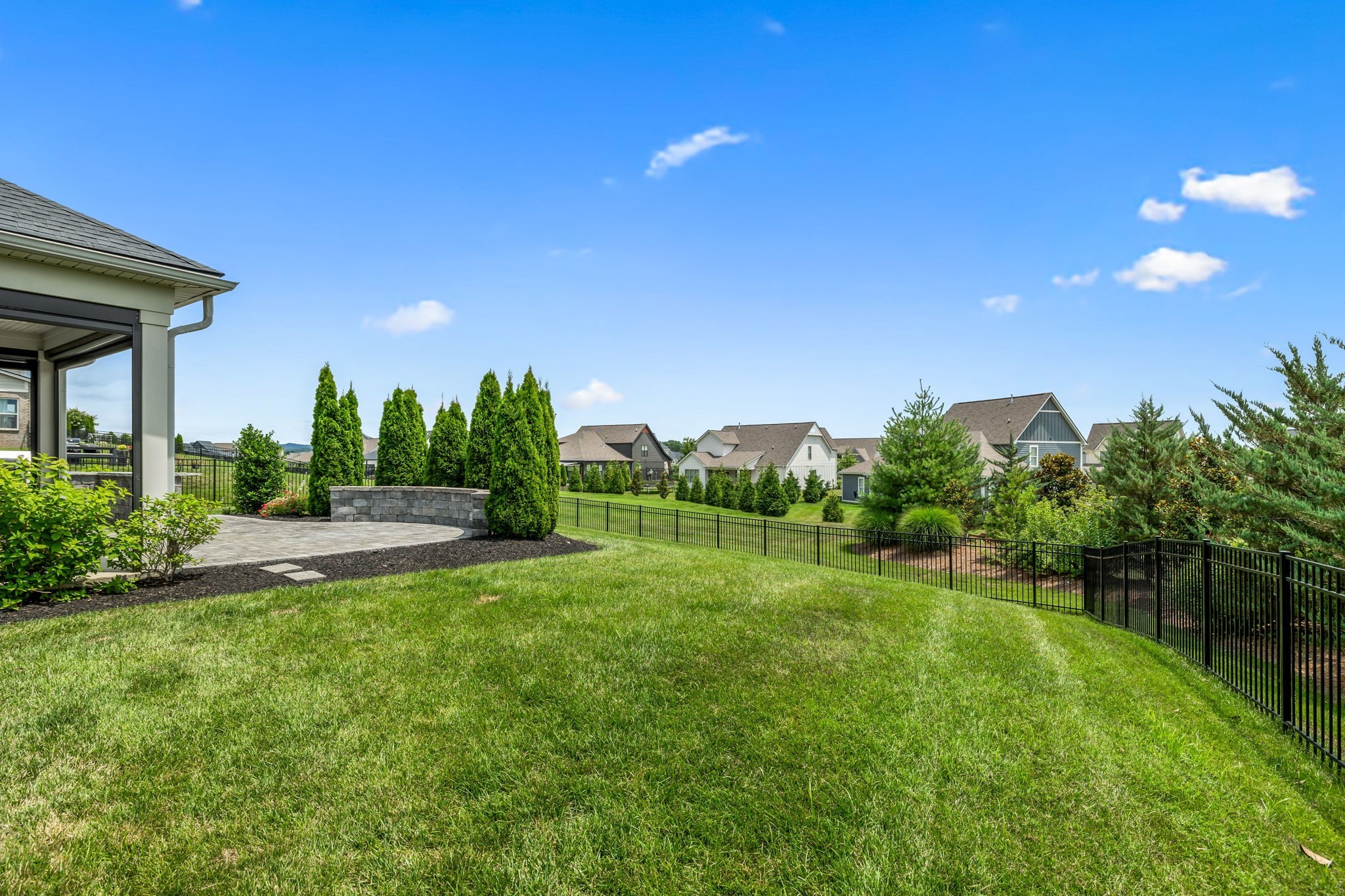 7204 Ludlow Drive College Grove, TN 37046 - Photo 46 of 59 a view of a garden with a building in the background