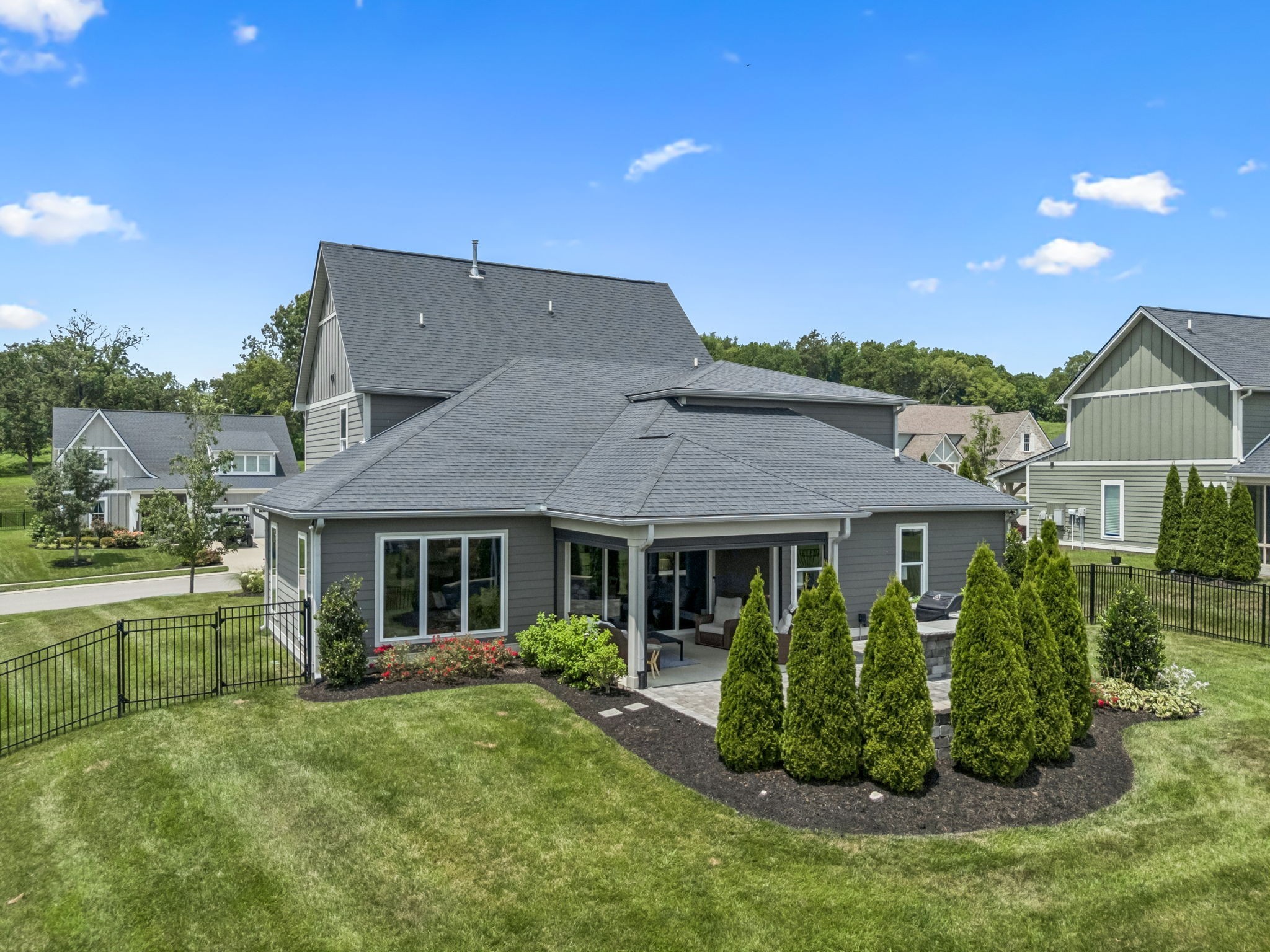 7204 Ludlow Drive College Grove, TN 37046 - Photo 48 of 59 a front view of a house with a garden