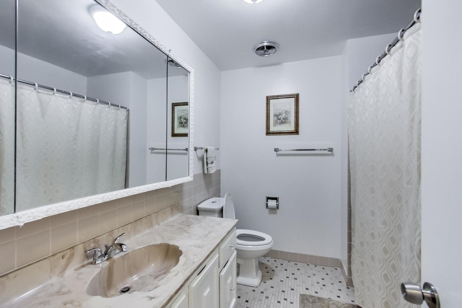 9801 Gross Point Road, Unit 306 Skokie, IL 60076 - Photo 26 of 30