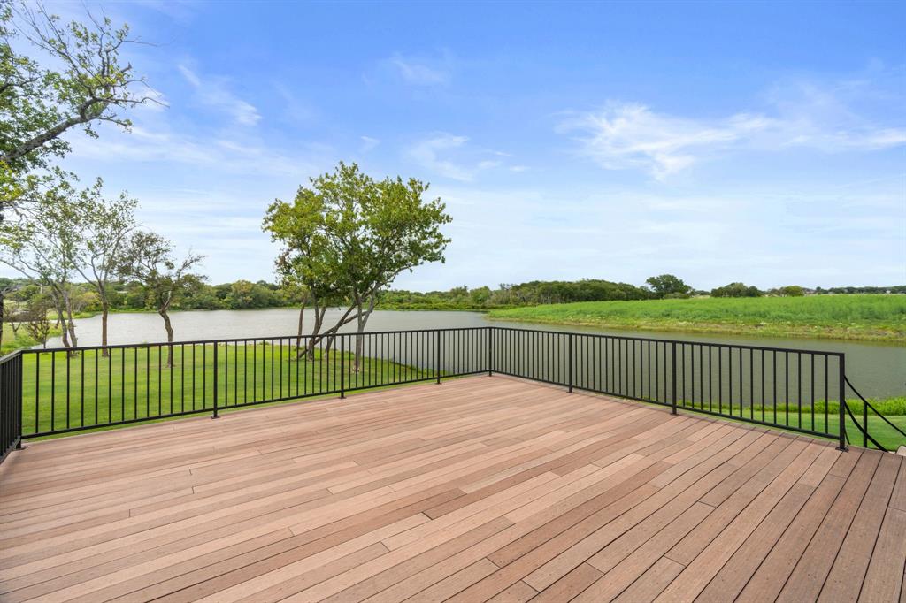2402 Country Club Road Ennis, TX 75119 - Photo 22 of 33 a view of a deck with a yard