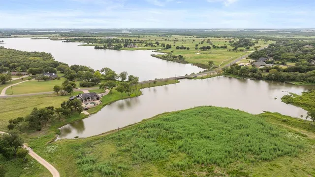 a view of a lake with a city