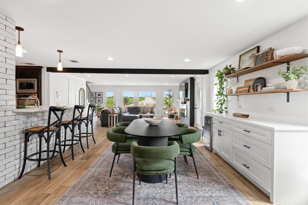 2402 Country Club Road Ennis, TX 75119 - Photo 7 of 33 a view of a dining room with furniture