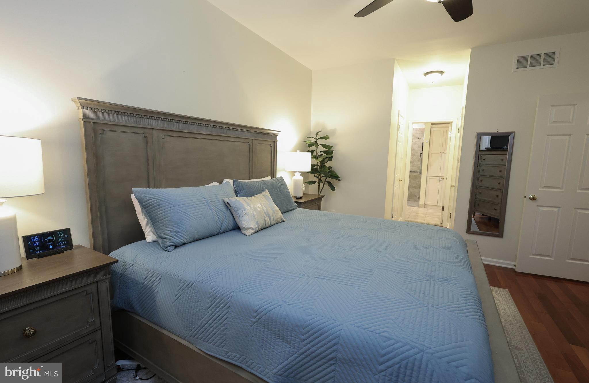 2602 Waterford Road Yardley, PA 19067 - Photo 15 of 33 a bedroom with a bed and wooden floor