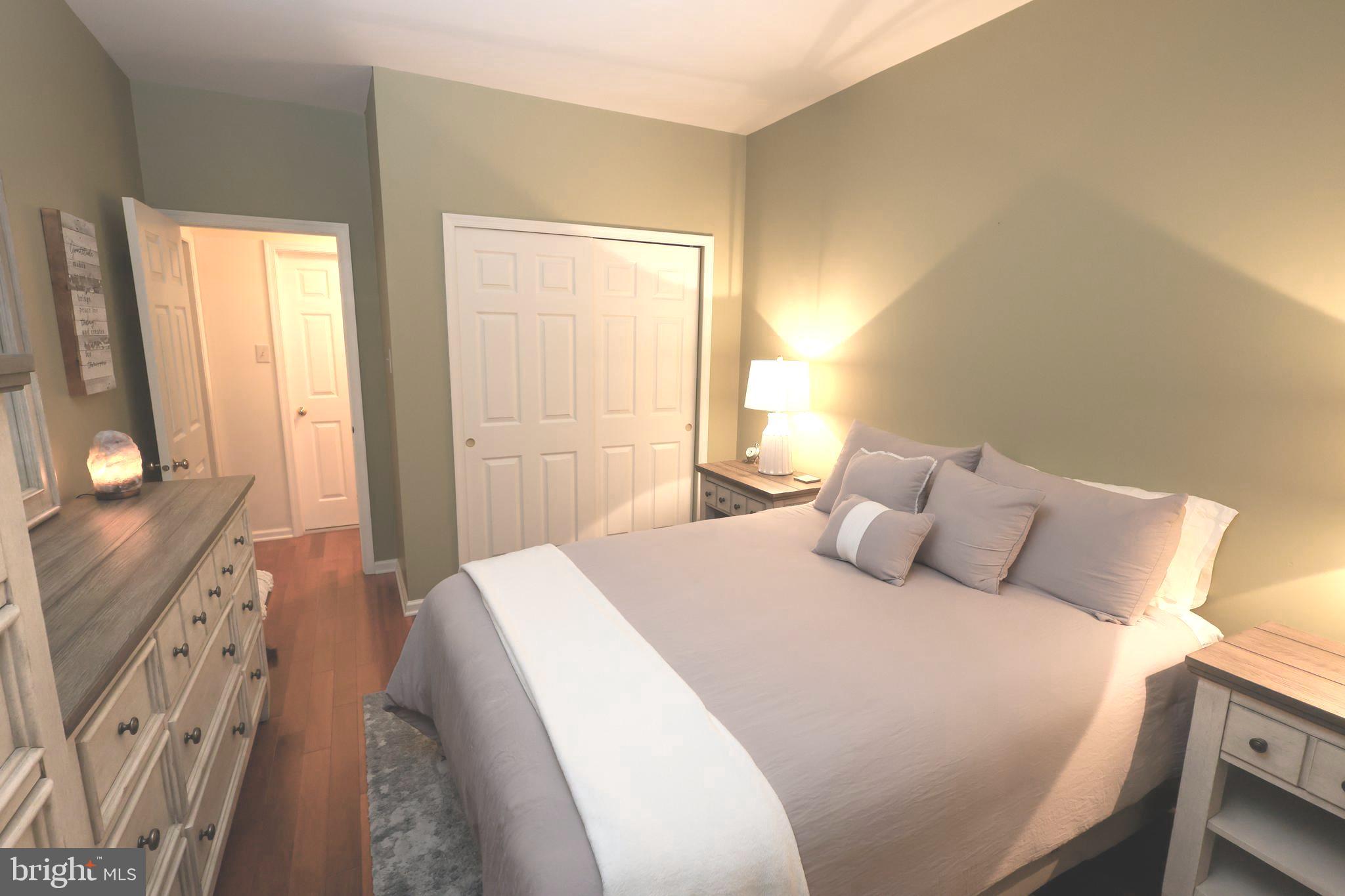 2602 Waterford Road Yardley, PA 19067 - Photo 19 of 33 a bedroom with a bed and a flat tv screen on dresser