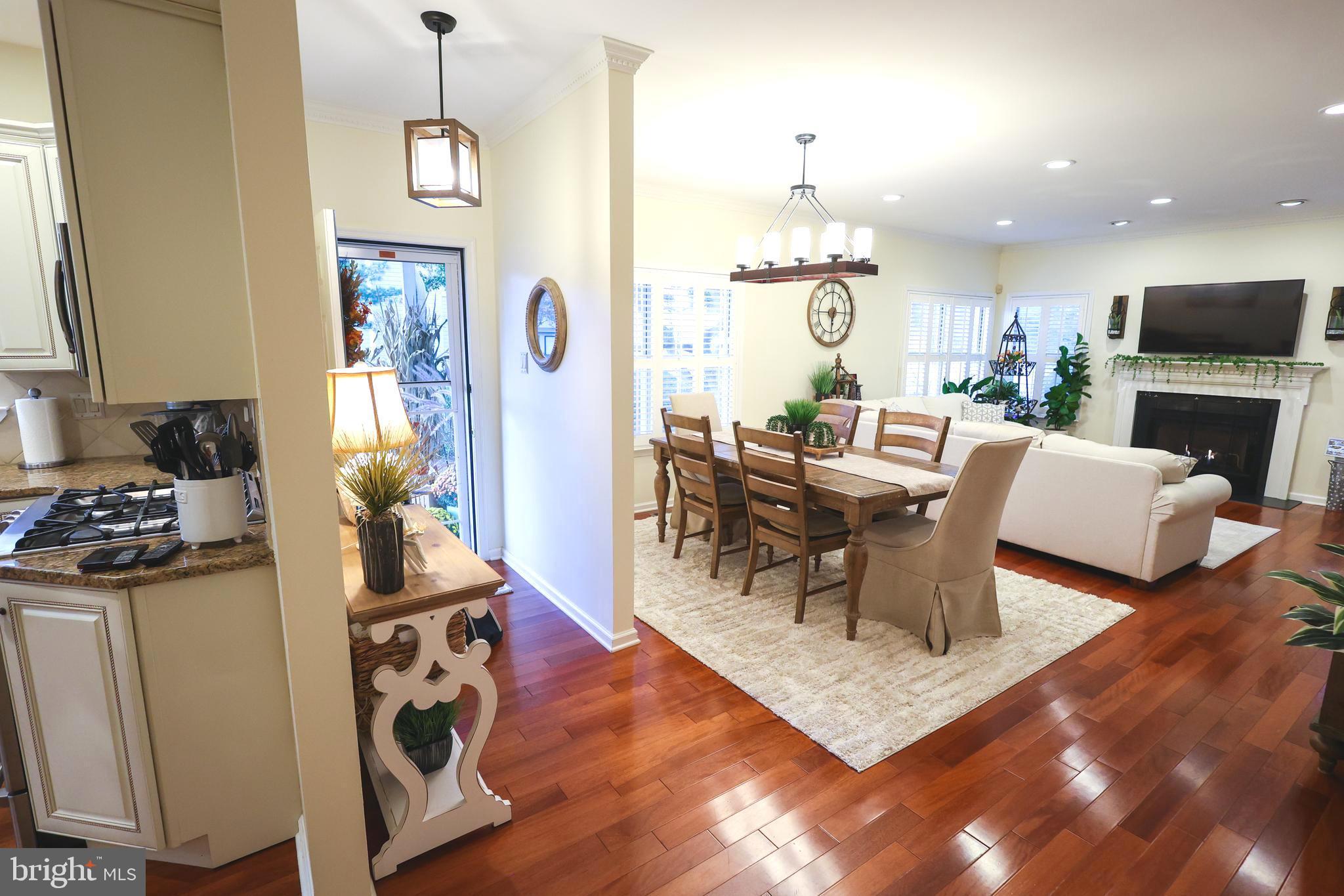 2602 Waterford Road Yardley, PA 19067 - Photo 2 of 33 a living room with furniture a flat screen tv and a table