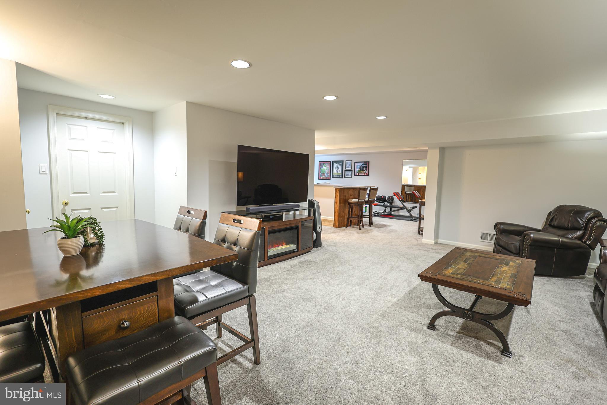 2602 Waterford Road Yardley, PA 19067 - Photo 23 of 33 a living room with furniture and a flat screen tv