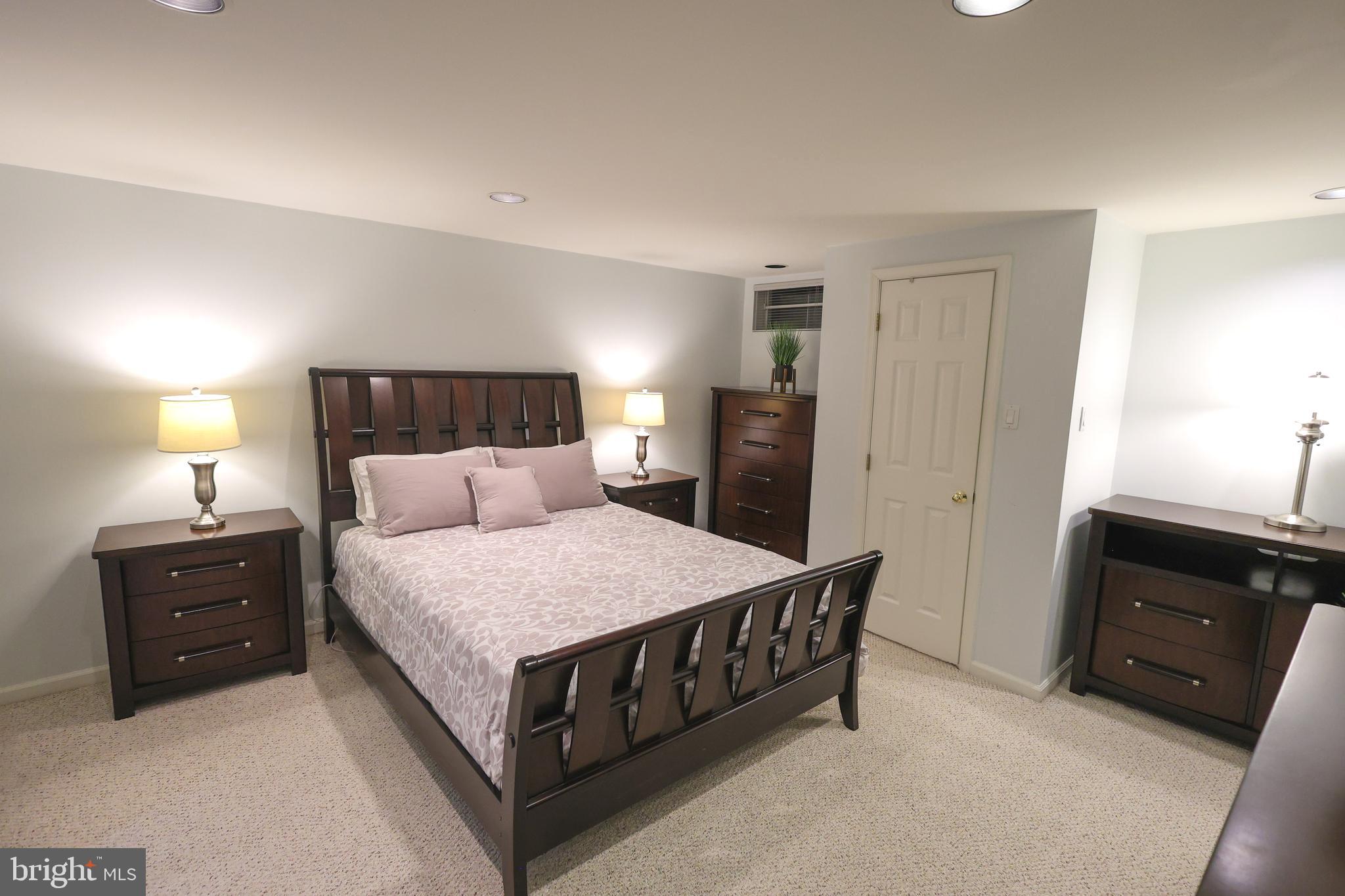2602 Waterford Road Yardley, PA 19067 - Photo 26 of 33 a bedroom with a bed and a tv