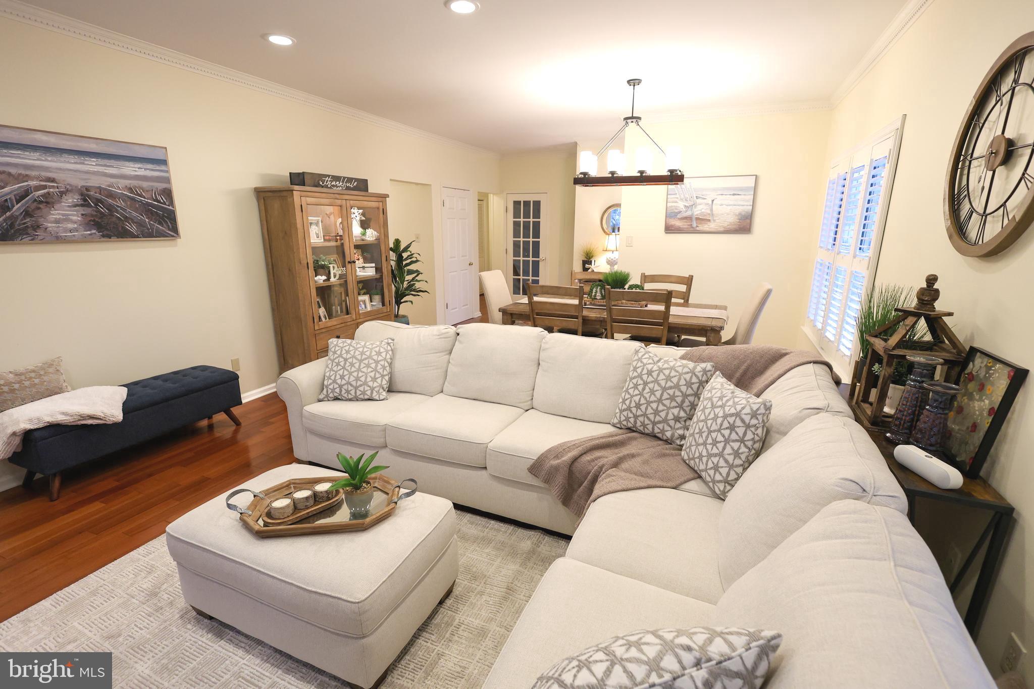 2602 Waterford Road Yardley, PA 19067 - Photo 4 of 33 a living room with furniture and a chandelier