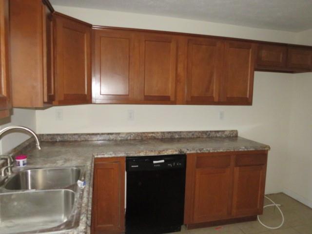 347 Clark Street Washington, PA 15301 - Photo 24 of 25 a kitchen with granite countertop cabinets and sink