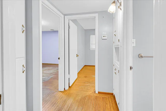 a view of a bathroom with bathtub and shower