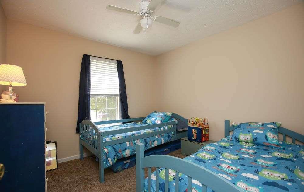 177 Rustin Drive Dallas, GA 30157 - Photo 24 of 26 a bedroom with two beds and window