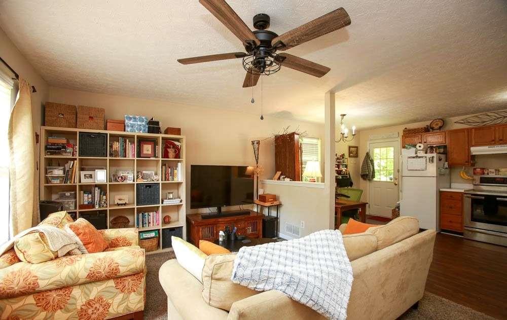 177 Rustin Drive Dallas, GA 30157 - Photo 5 of 26 a living room with furniture a ceiling fan and a window