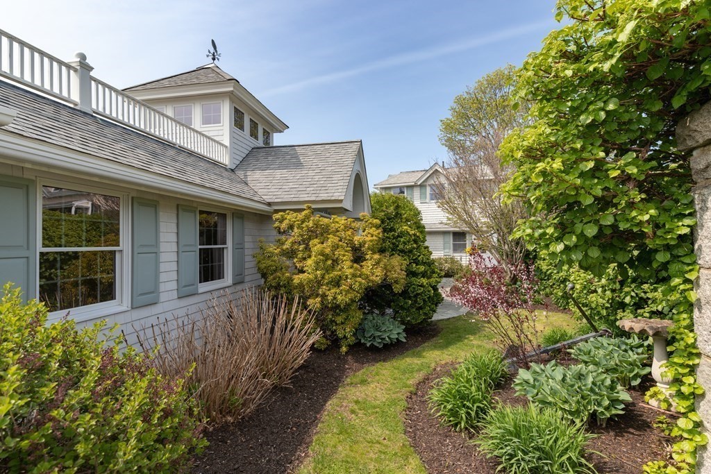 50 Shore Road Gloucester, MA 01930 - Photo 14 of 41 front view of a house with a yard
