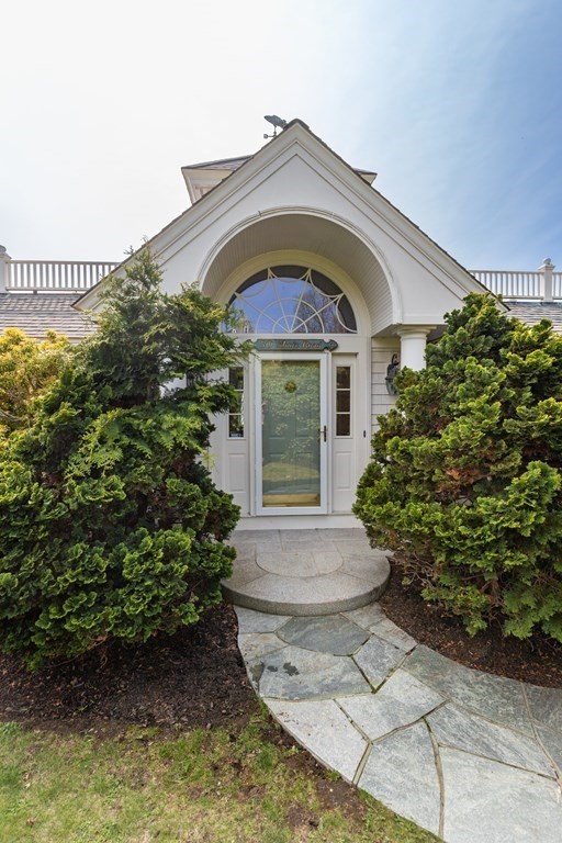 50 Shore Road Gloucester, MA 01930 - Photo 16 of 41 a front view of a house with a garden