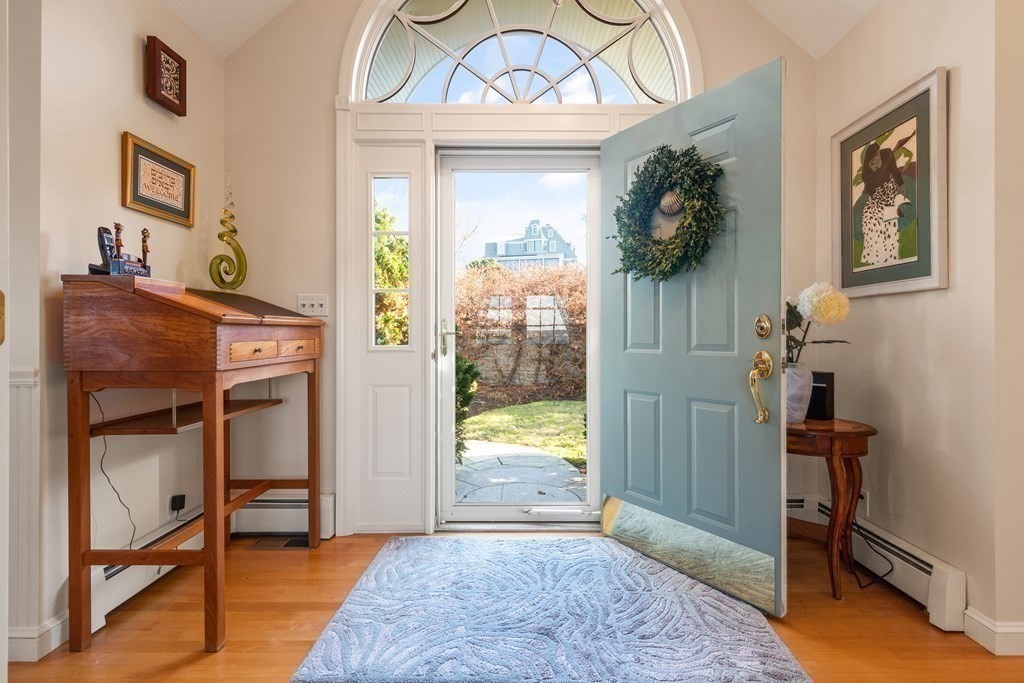 50 Shore Road Gloucester, MA 01930 - Photo 17 of 41 a view of a hallway to a livingroom with furniture window and front door