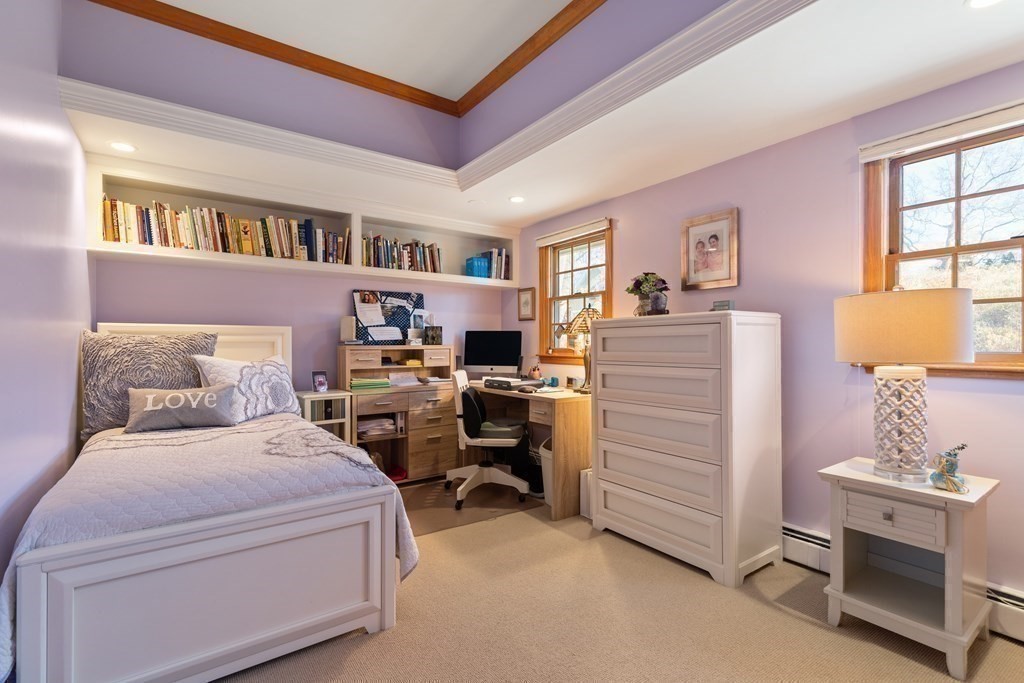 50 Shore Road Gloucester, MA 01930 - Photo 28 of 41 a bedroom with a bed and furniture