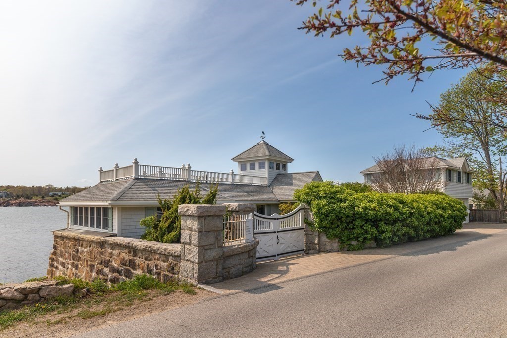 50 Shore Road Gloucester, MA 01930 - Photo 32 of 41 a front view of a house with garden