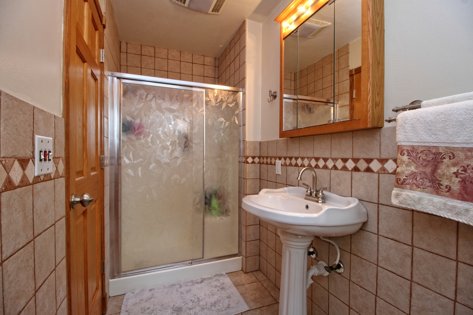 9763 West 1000S Road Bonfield, IL 60913 - Photo 14 of 23 a bathroom with a sink shower and a mirror