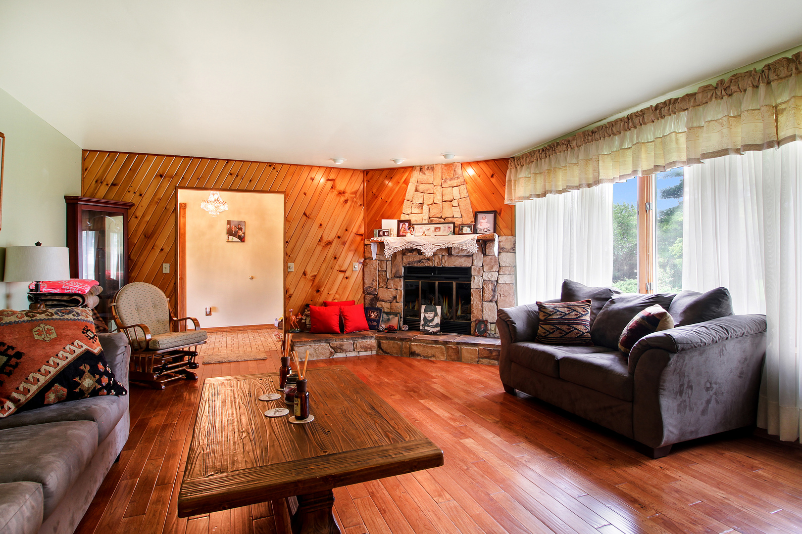 9763 West 1000S Road Bonfield, IL 60913 - Photo 3 of 23 a living room with furniture and a fireplace