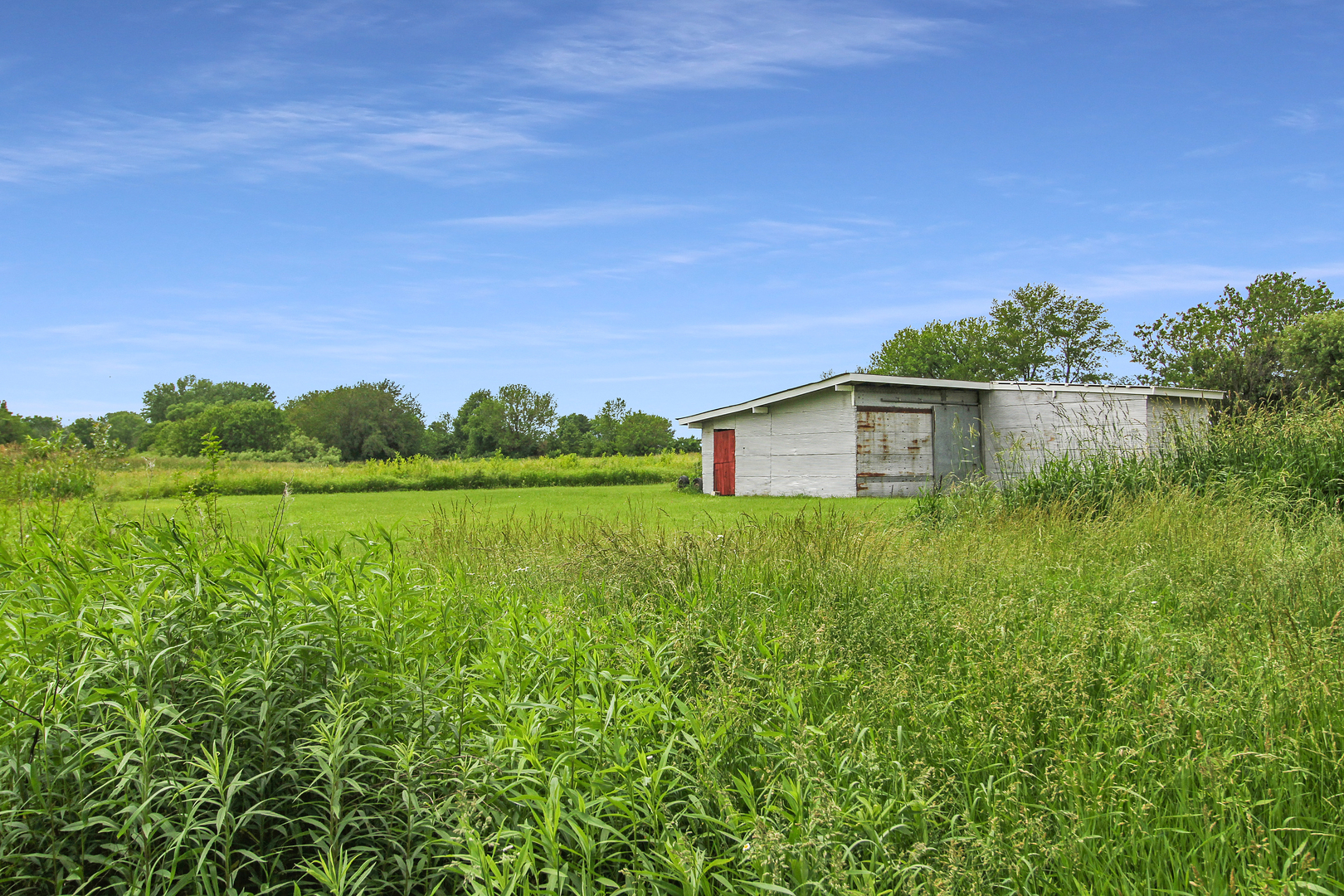 9763 West 1000S Road Bonfield, IL 60913 - Photo 22 of 23 a house view with a lake view