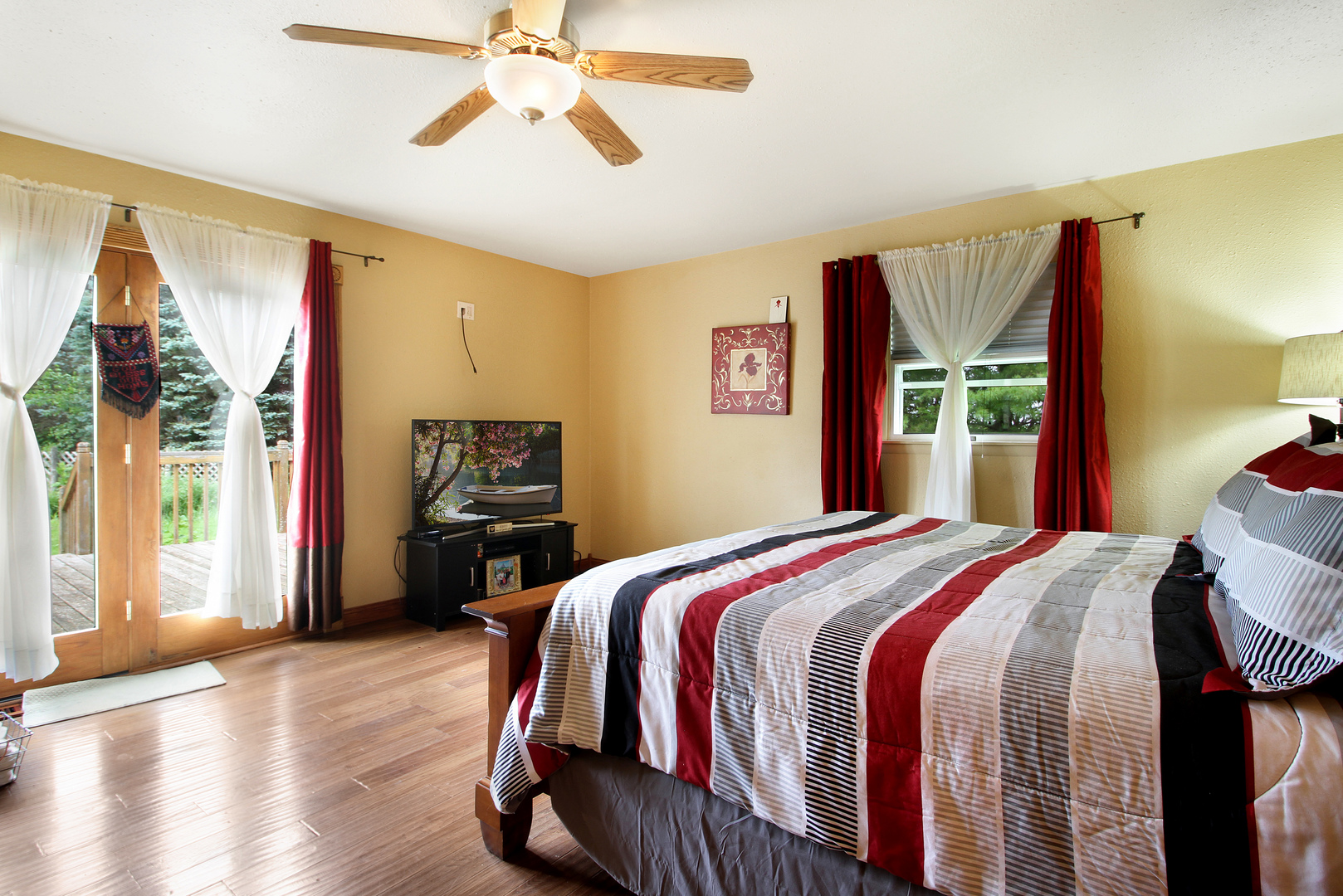 9763 West 1000S Road Bonfield, IL 60913 - Photo 9 of 23 a bedroom with a bed and wooden floor