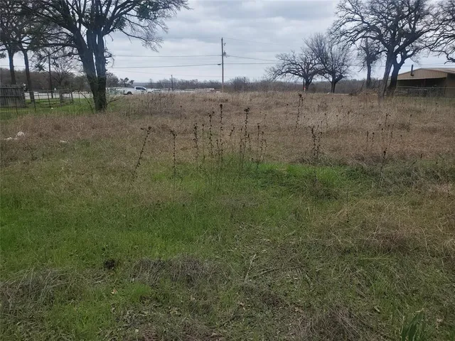 a view of a golf course with a lake