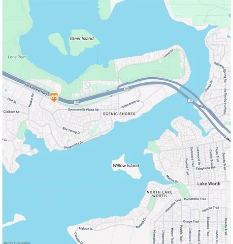 a bathroom with a sink mirror and vanity