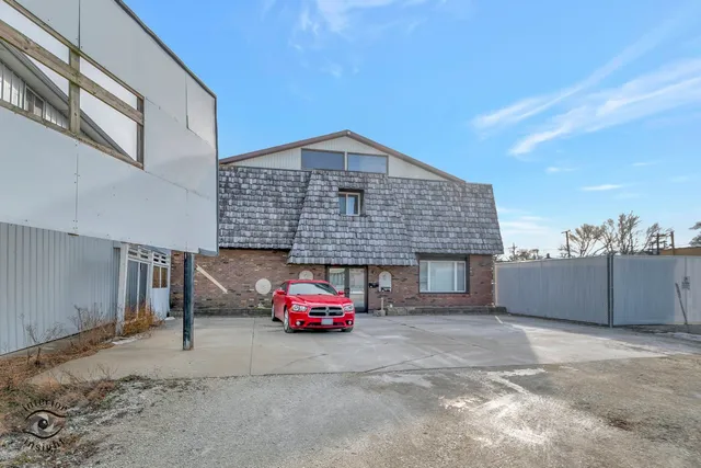 a car parked in front of a house