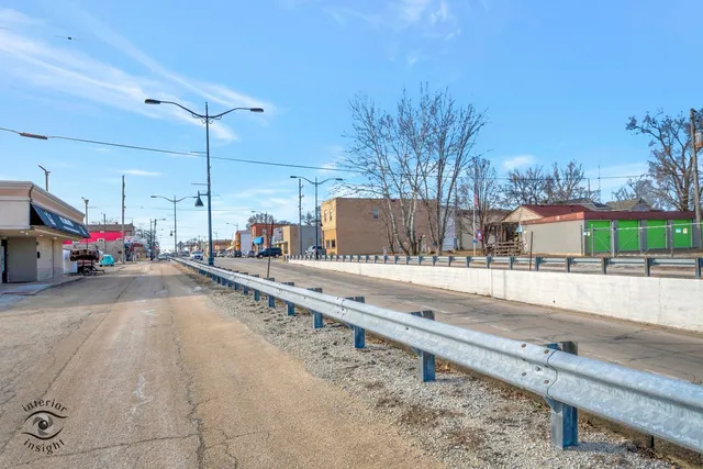 a view of street with cars