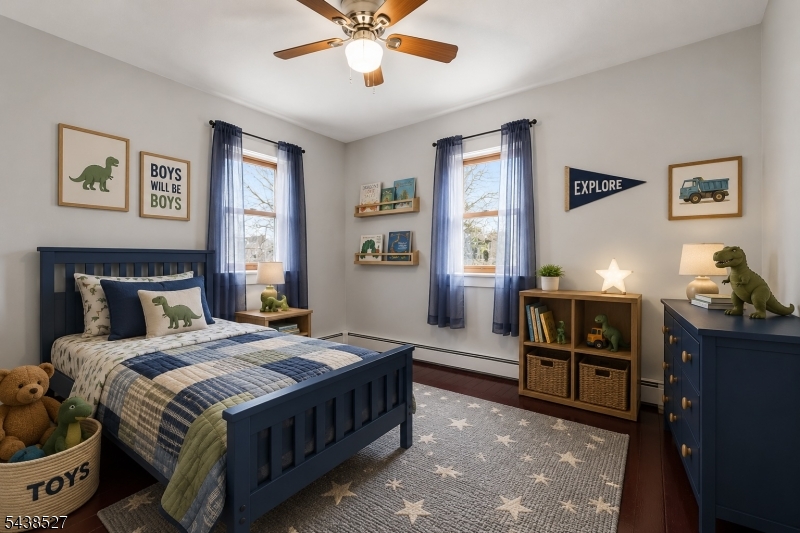83 Highway 15 Lafayette, NJ 07848 - Photo 9 of 20 a bedroom with a bed and wooden floor