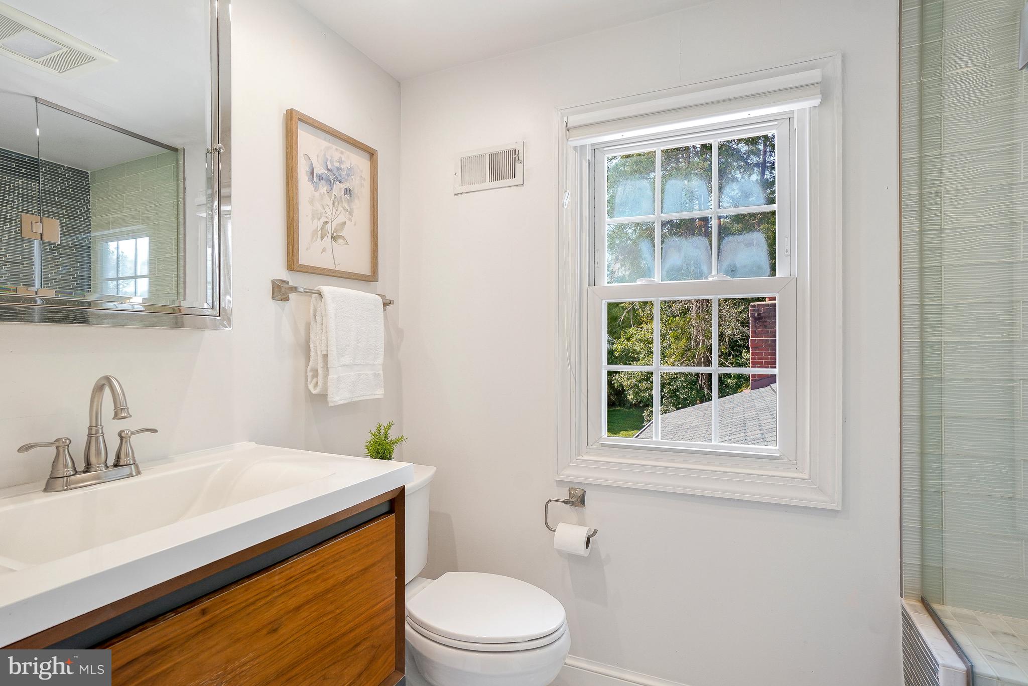 15400 Layhill Road Silver Spring, MD 20906 - Photo 29 of 45 upper level renovated bath with walk in shower