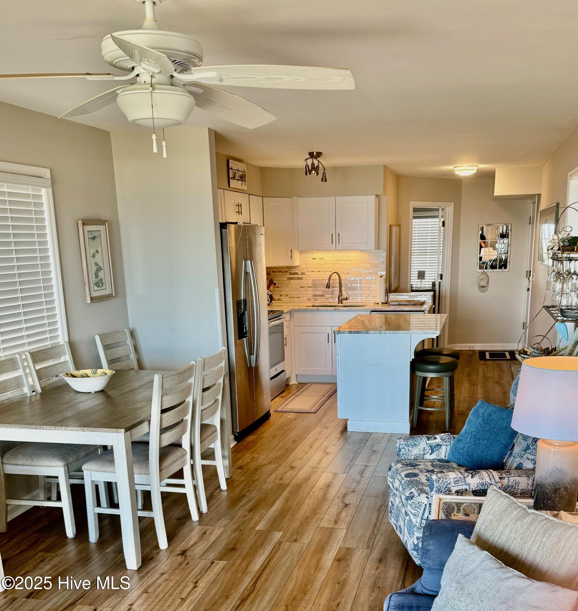 31 Ocean Isle W Boulevard, Unit 32 Ocean Isle Beach, NC 28469 - Photo 4 of 15 Open Kitchen and Living