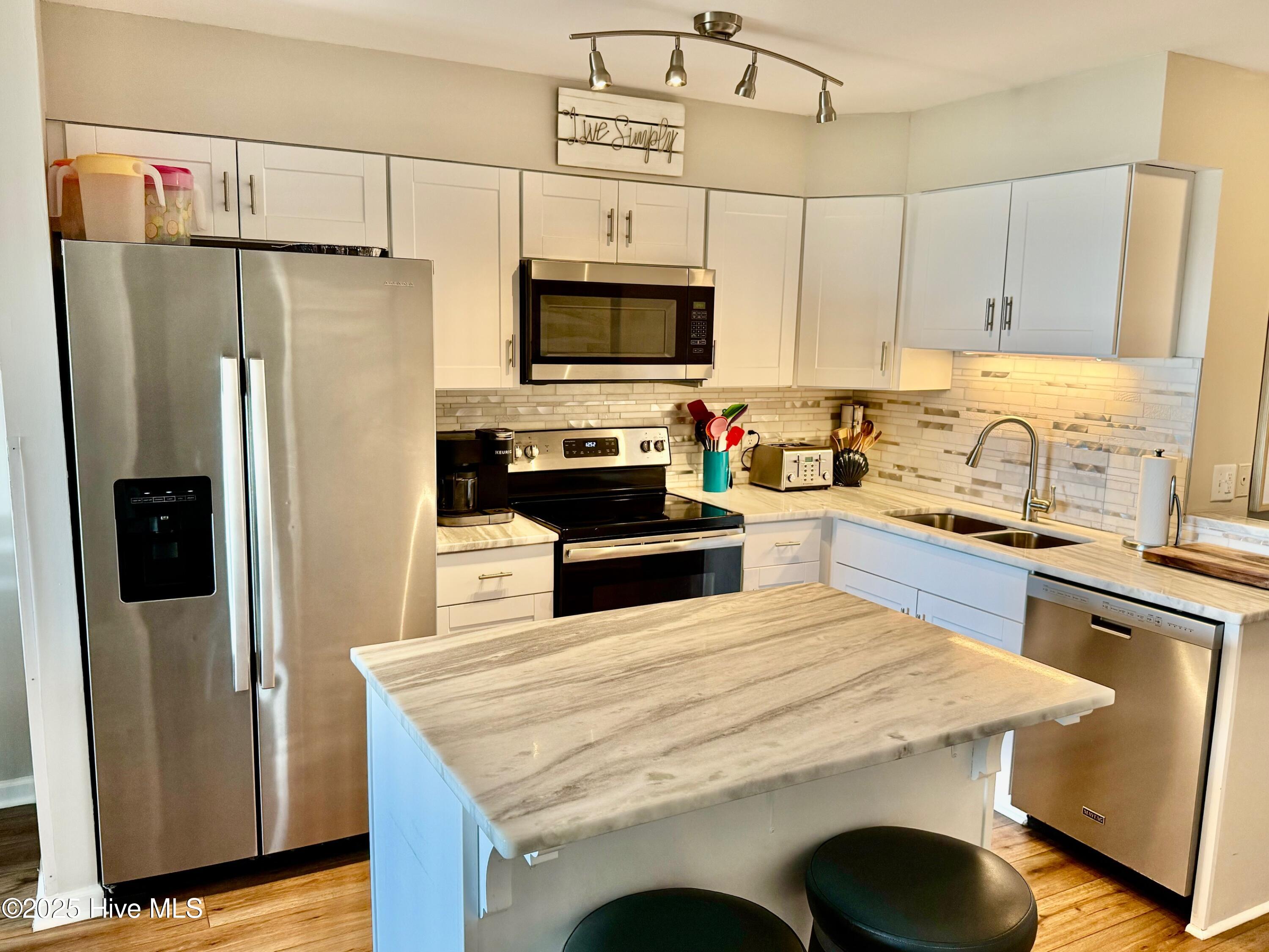 31 Ocean Isle W Boulevard, Unit 32 Ocean Isle Beach, NC 28469 - Photo 5 of 15 IMG_7788