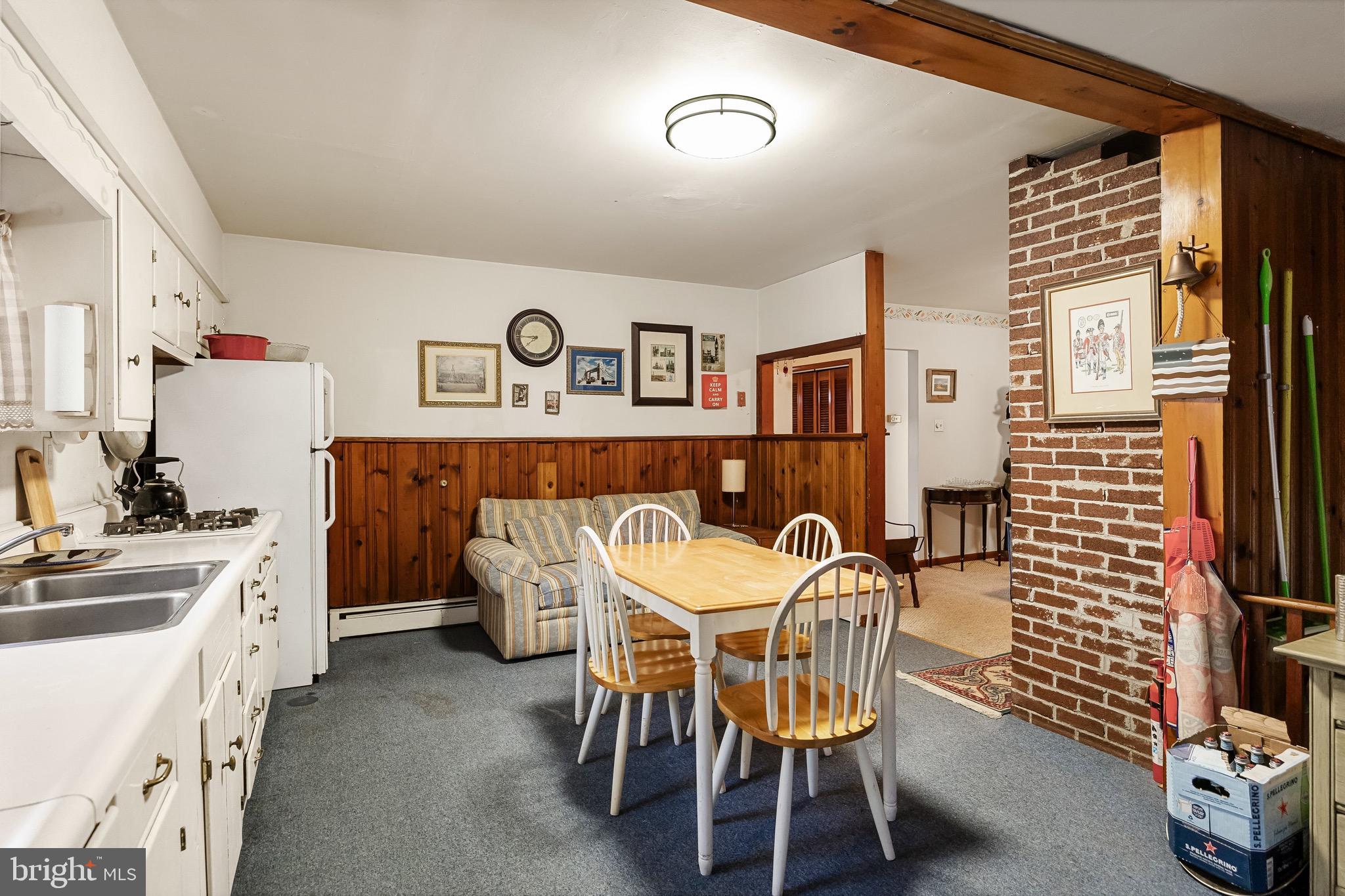 708 Bem Street Riverside, NJ 08075 - Photo 13 of 26 a view of a dining room with furniture and chandelier