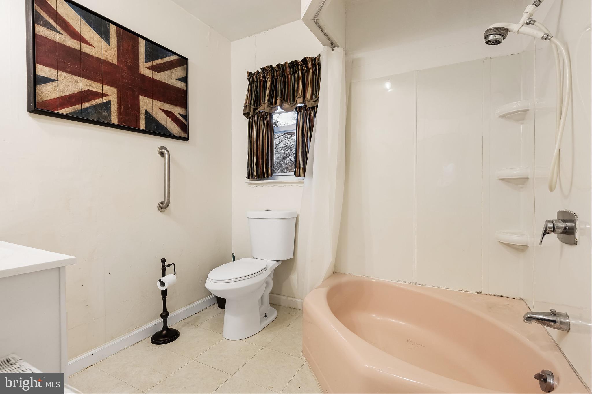 708 Bem Street Riverside, NJ 08075 - Photo 20 of 26 a bathroom with a toilet sink and mirror