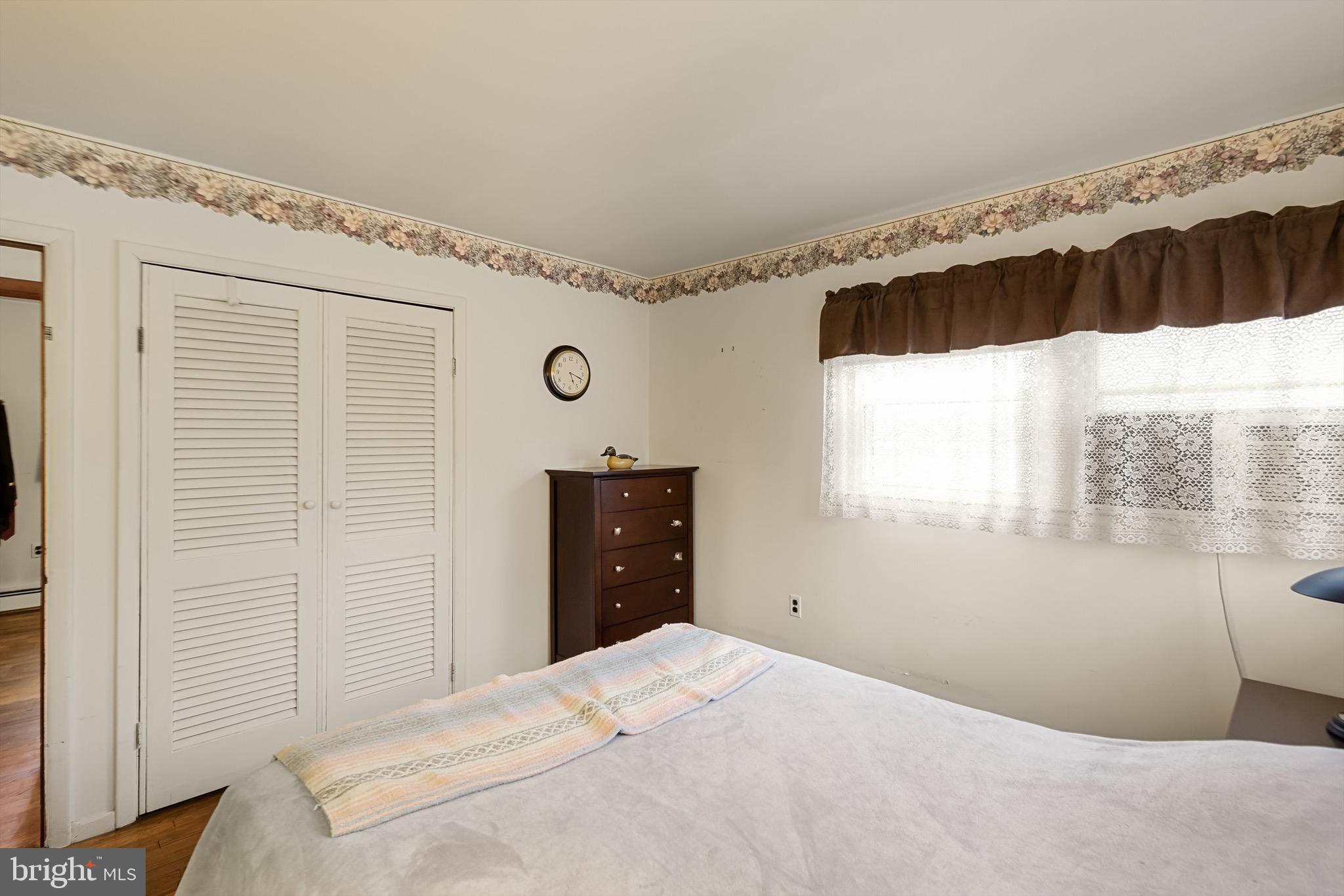 708 Bem Street Riverside, NJ 08075 - Photo 23 of 26 a bedroom with a bed and a window