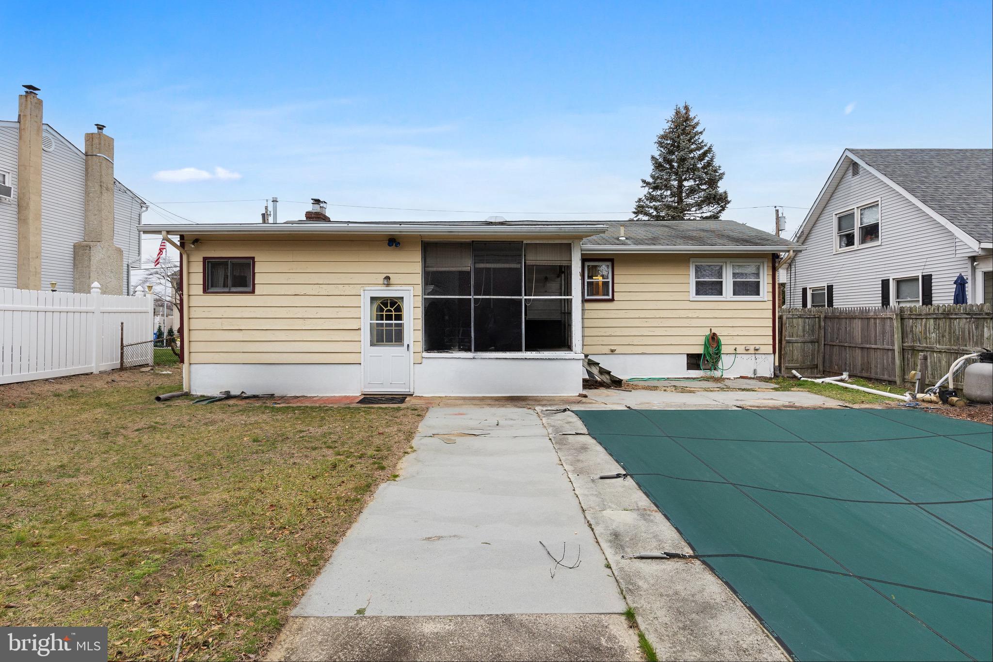 708 Bem Street Riverside, NJ 08075 - Photo 26 of 26 a front view of a house with a yard and garage