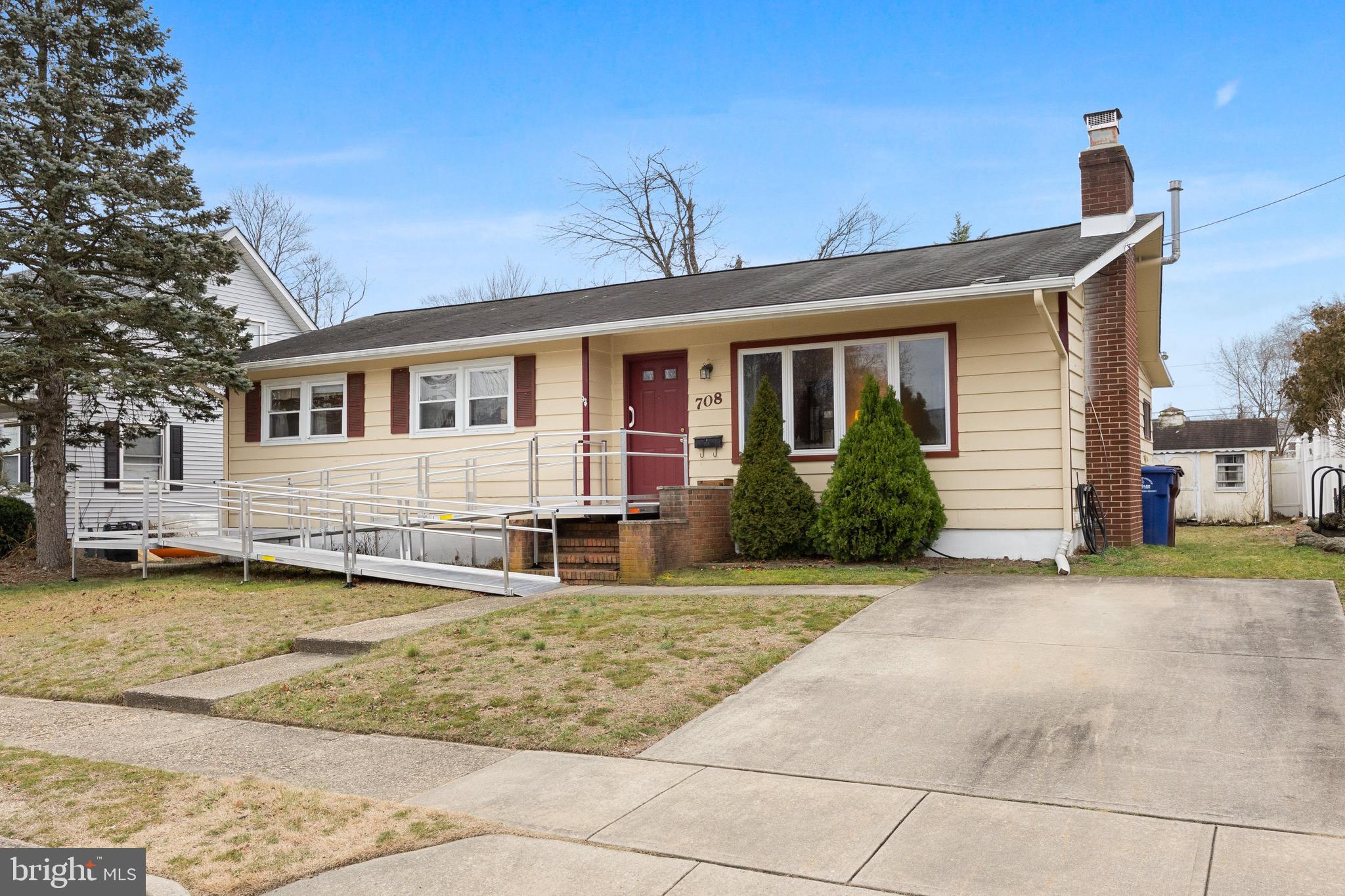 708 Bem Street Riverside, NJ 08075 - Photo 3 of 26 a front view of a house with a yard
