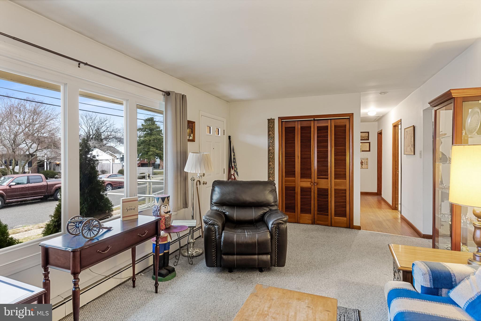 708 Bem Street Riverside, NJ 08075 - Photo 9 of 26 a living room with furniture and a large window