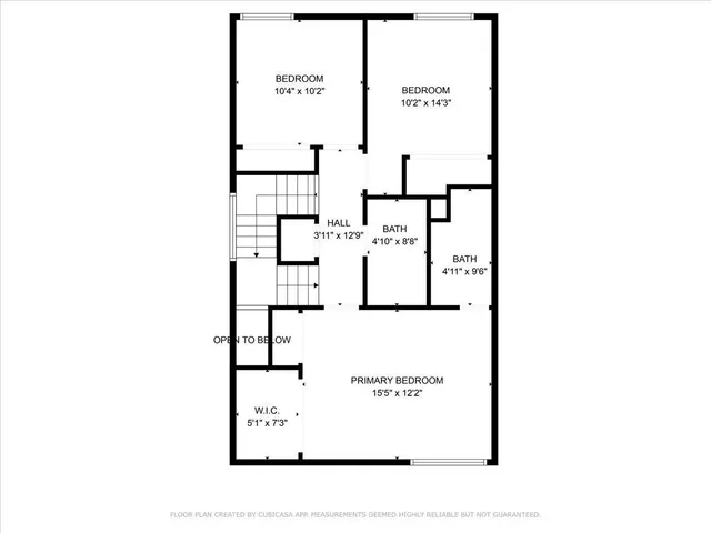 a picture of a bench in front of a wall