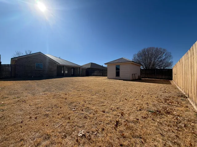 a house view with a outdoor space