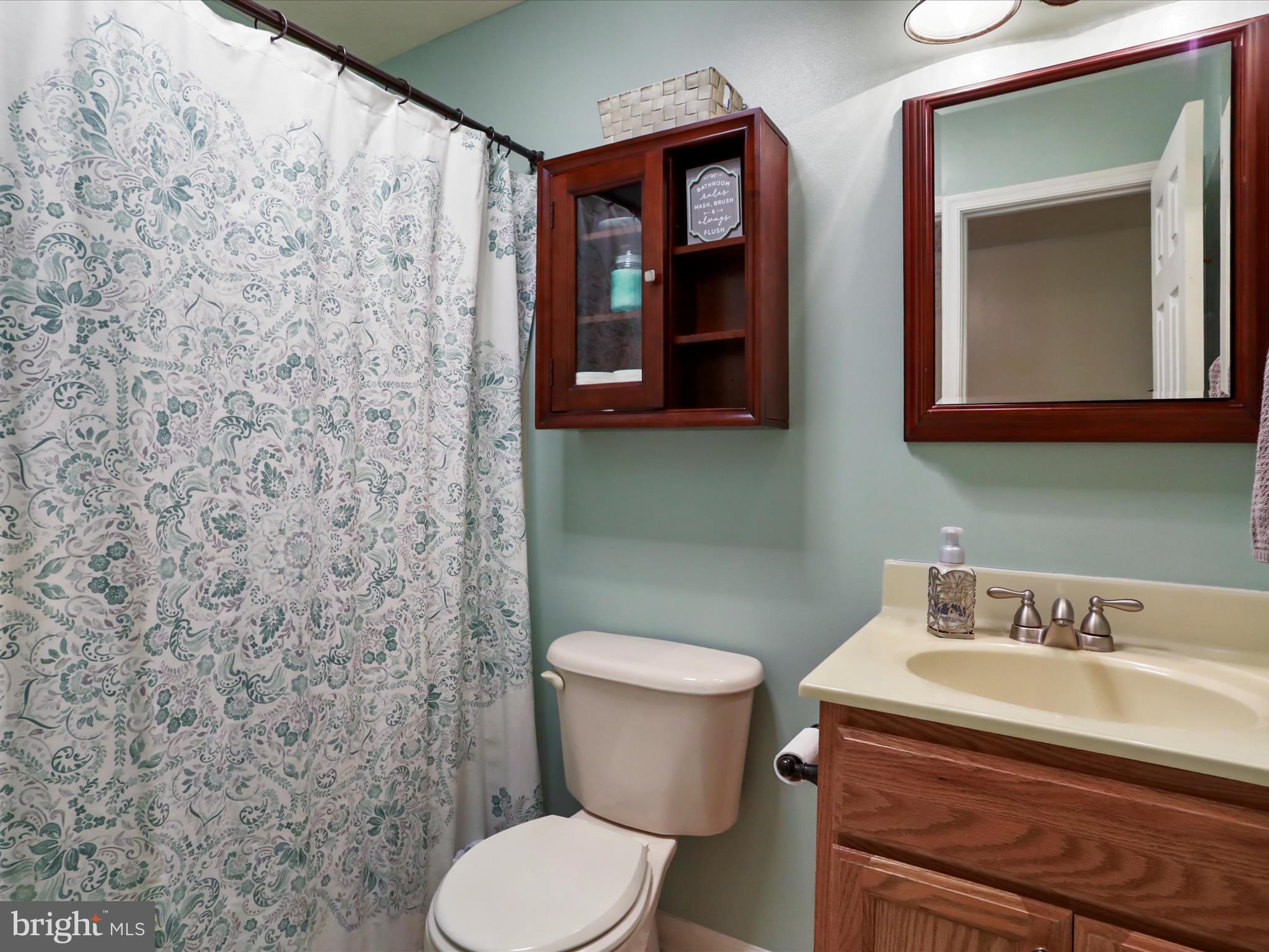 32 Greenfield Road Front Royal, VA 22630 - Photo 16 of 49 a bathroom with a toilet sink and mirror