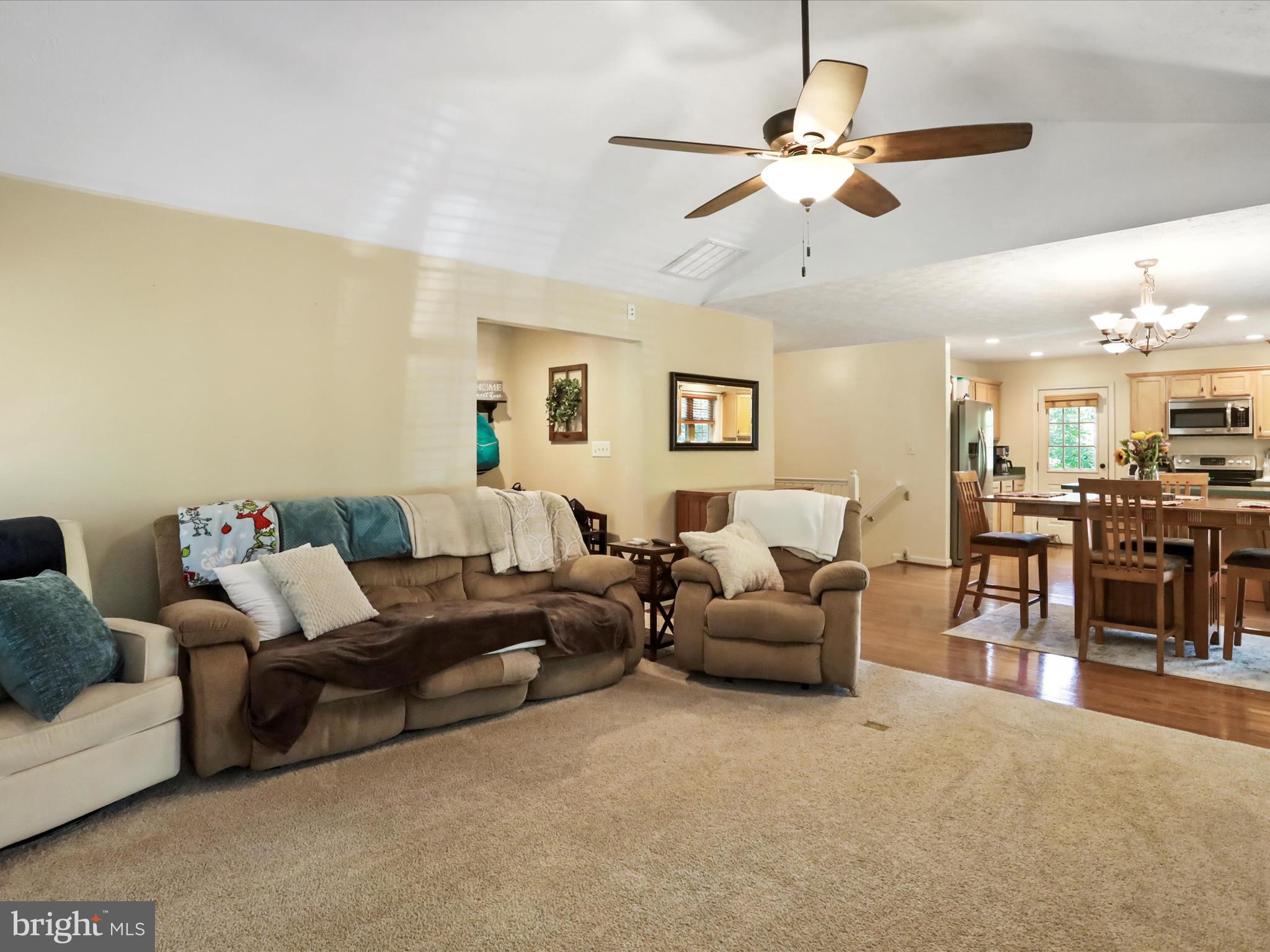 32 Greenfield Road Front Royal, VA 22630 - Photo 29 of 49 a living room with furniture and a ceiling fan