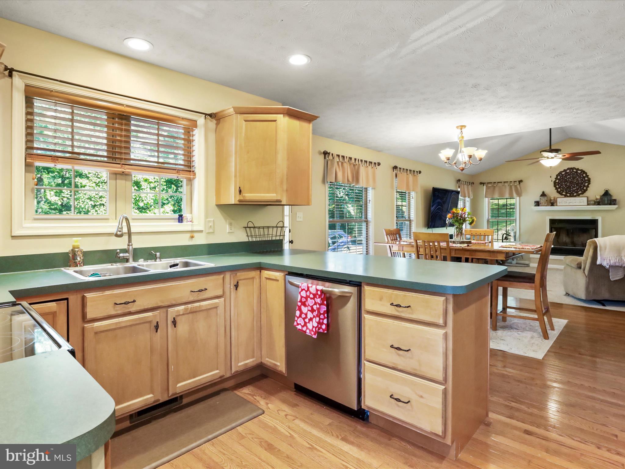 32 Greenfield Road Front Royal, VA 22630 - Photo 32 of 49 a kitchen with stainless steel appliances granite countertop a stove and cabinets