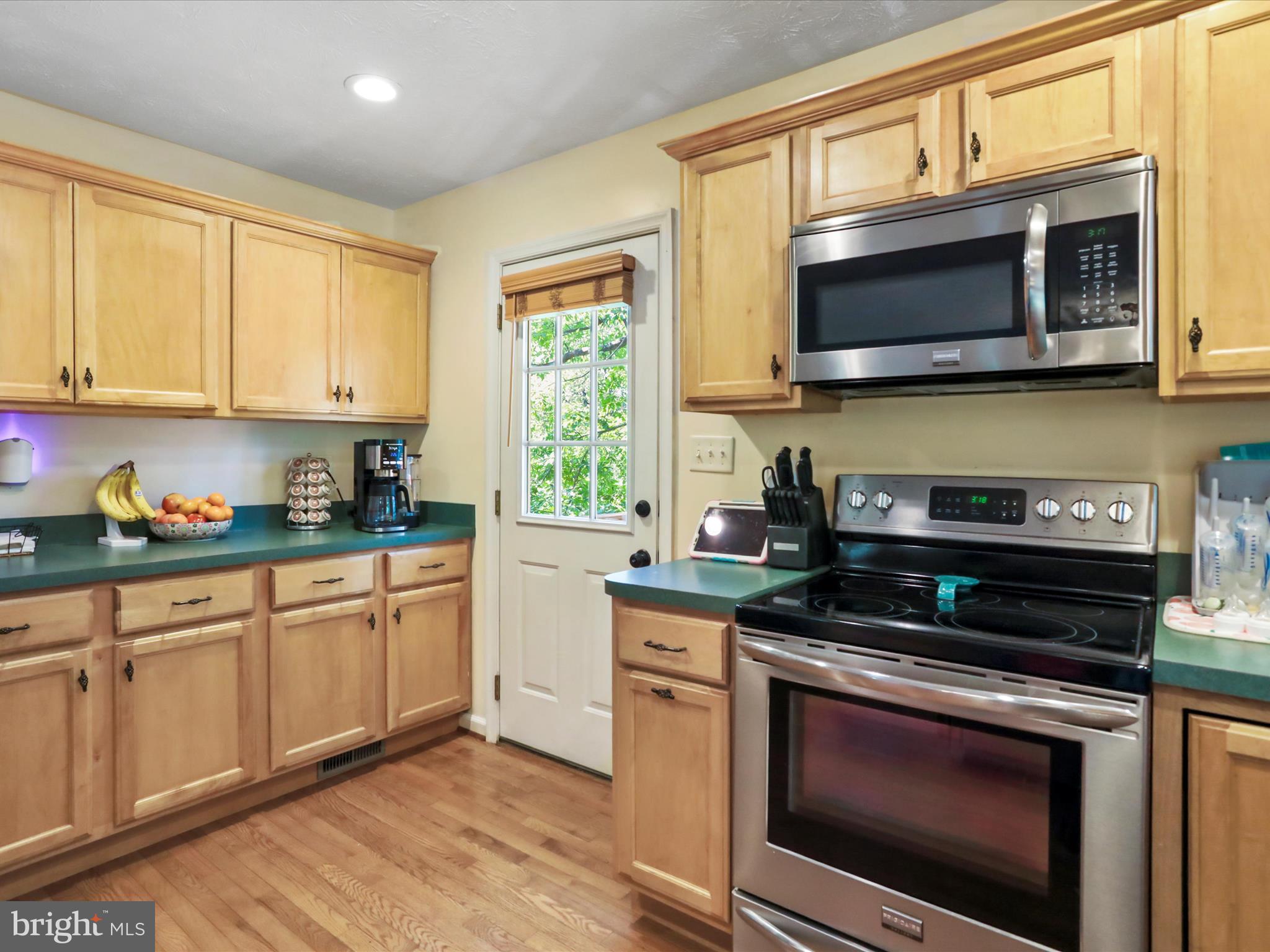 32 Greenfield Road Front Royal, VA 22630 - Photo 34 of 49 a kitchen with stainless steel appliances granite countertop a stove microwave and sink