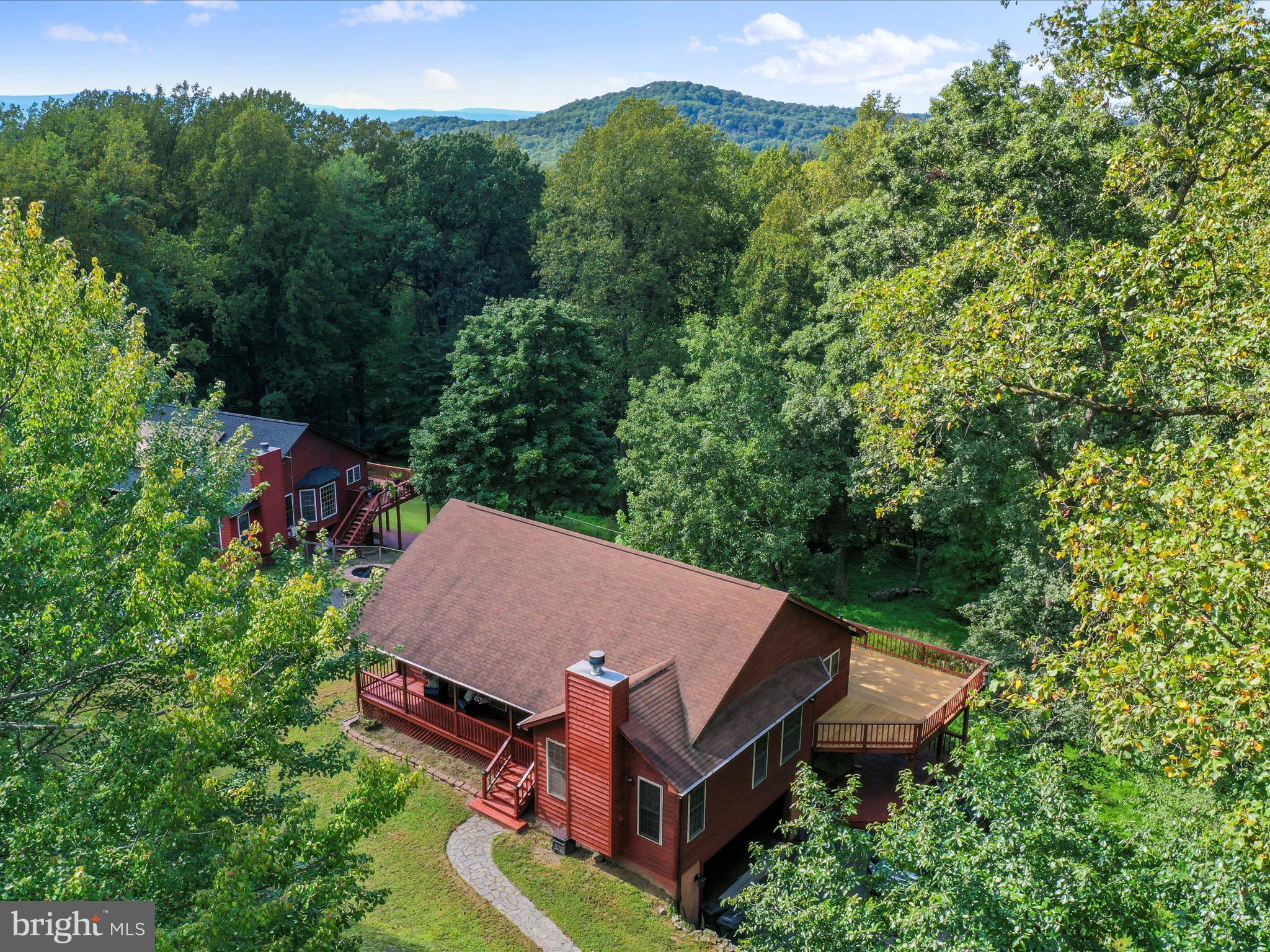 32 Greenfield Road Front Royal, VA 22630 - Photo 42 of 49 an aerial view of a house with yard and outdoor seating