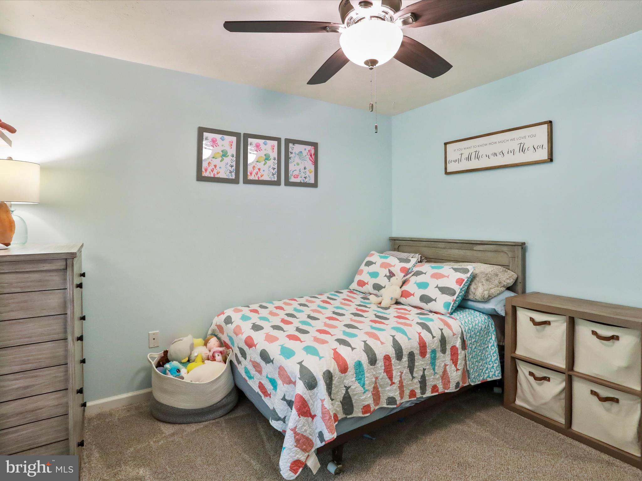32 Greenfield Road Front Royal, VA 22630 - Photo 5 of 49 a bedroom with a bed and a chandelier