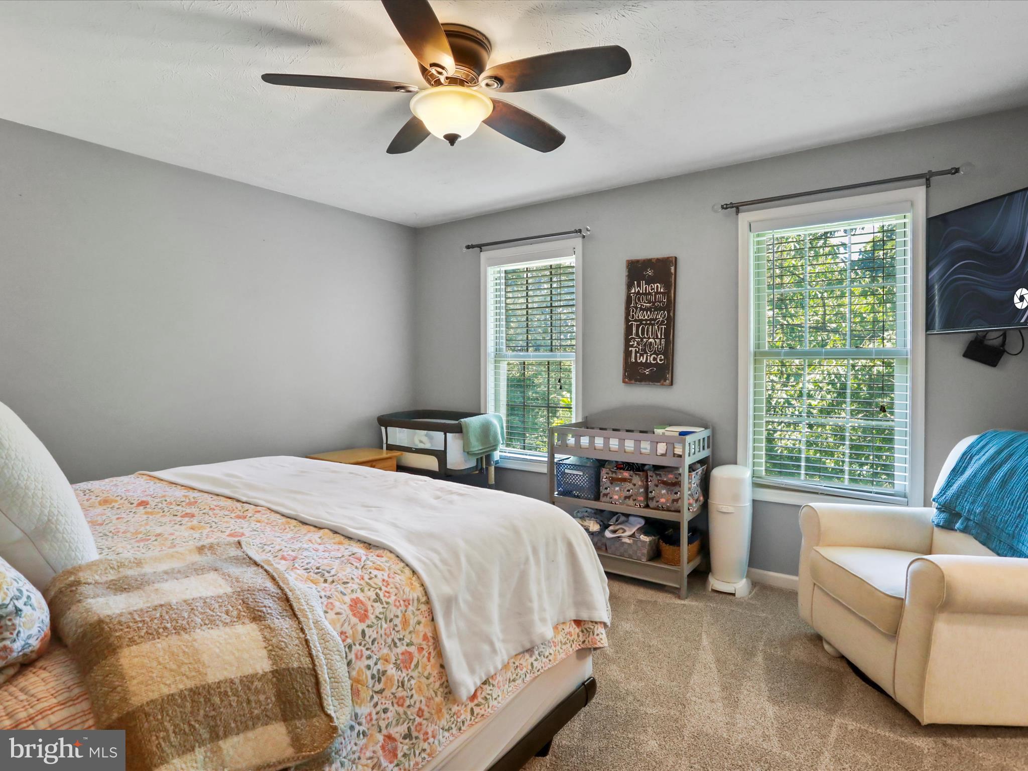 32 Greenfield Road Front Royal, VA 22630 - Photo 10 of 49 a bedroom with a bed and a couch