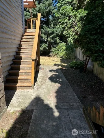 a view of a backyard of a house