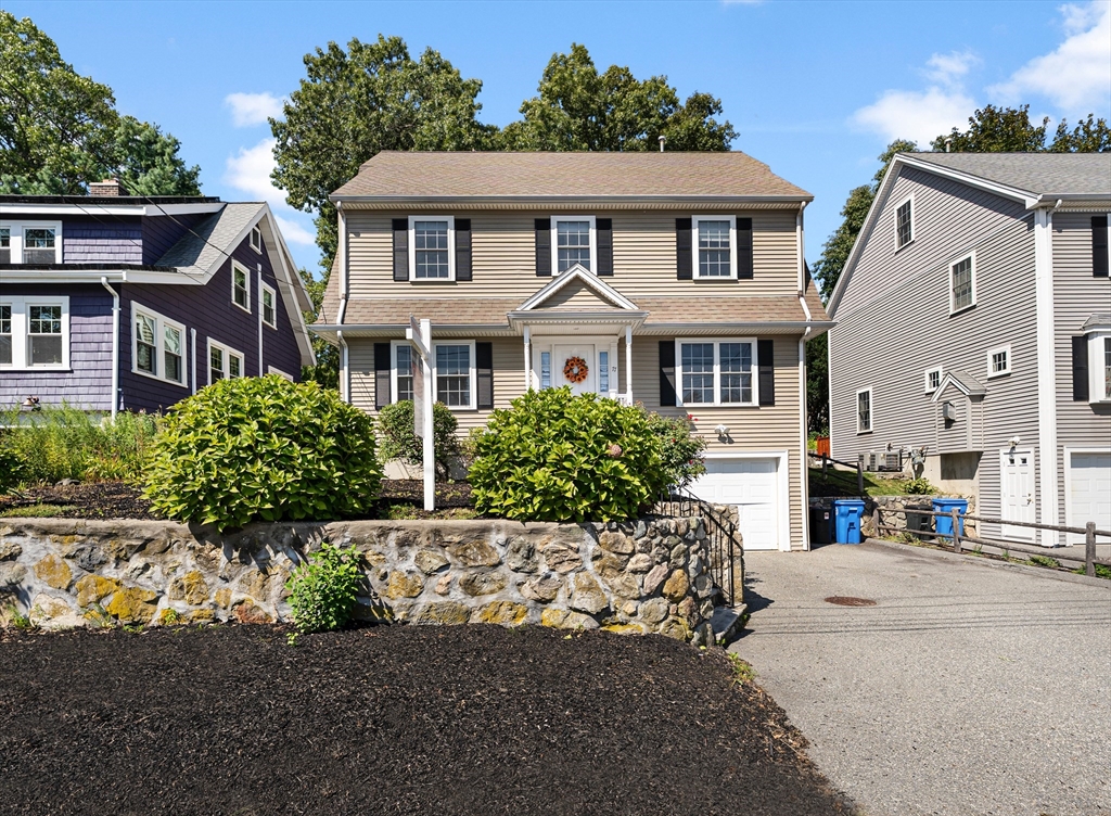 77 Hawthorne Road Waltham, MA 02451 - Photo 2 of 27 front view of a house with a street